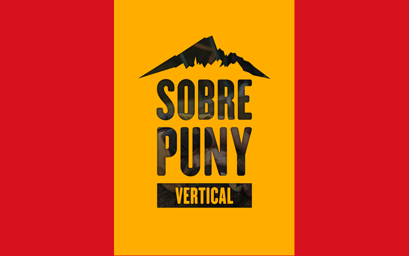 Logo de la sobrepunyt, imatge amb fons groc i el nom de la sobrepuny en negre, amb un logotip d'una muntanya a sobre.
